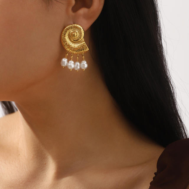 Fancy conch pearl earrings